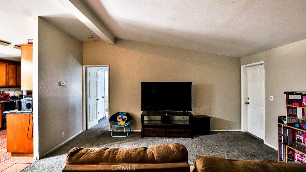2810 11th Street Riverside, CA 92507 - Photo 5 of 19 a living room with furniture and a flat screen tv