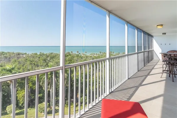 a view of a balcony with chair