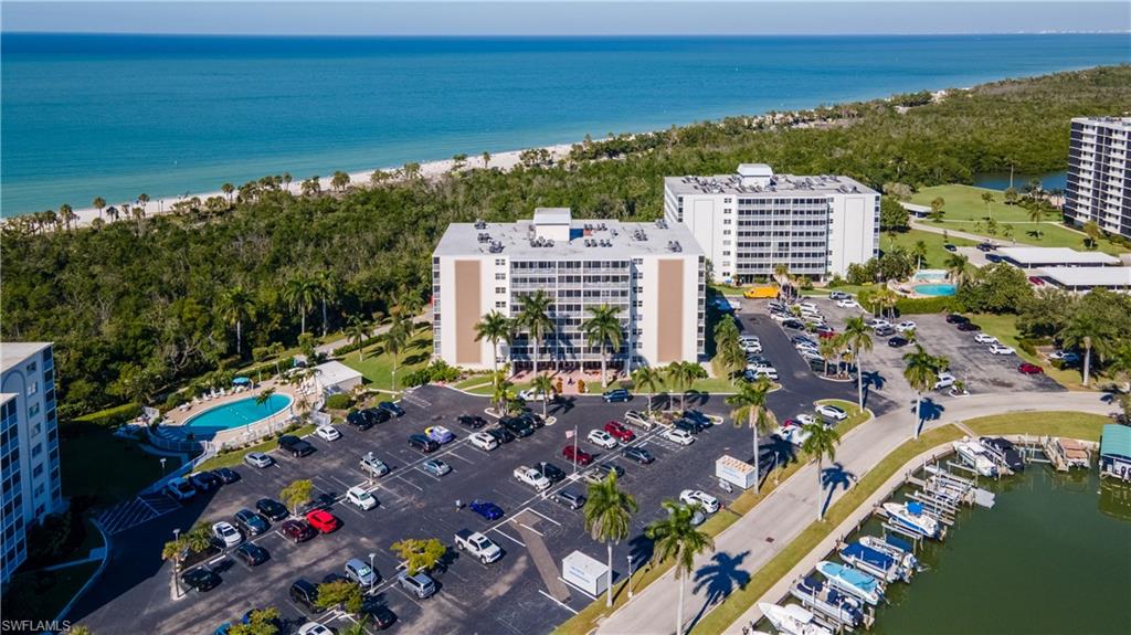 3 Bluebill Avenue, Unit 801 Naples, FL 34108 - Photo 23 of 29 a view of a city and ocean view