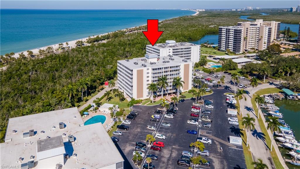 3 Bluebill Avenue, Unit 801 Naples, FL 34108 - Photo 26 of 29 a view of city and ocean