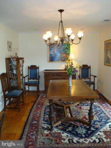 1 Hamill Road, Unit 1D Baltimore, MD 21210 - Photo 2 of 19 a view of a dining room with furniture