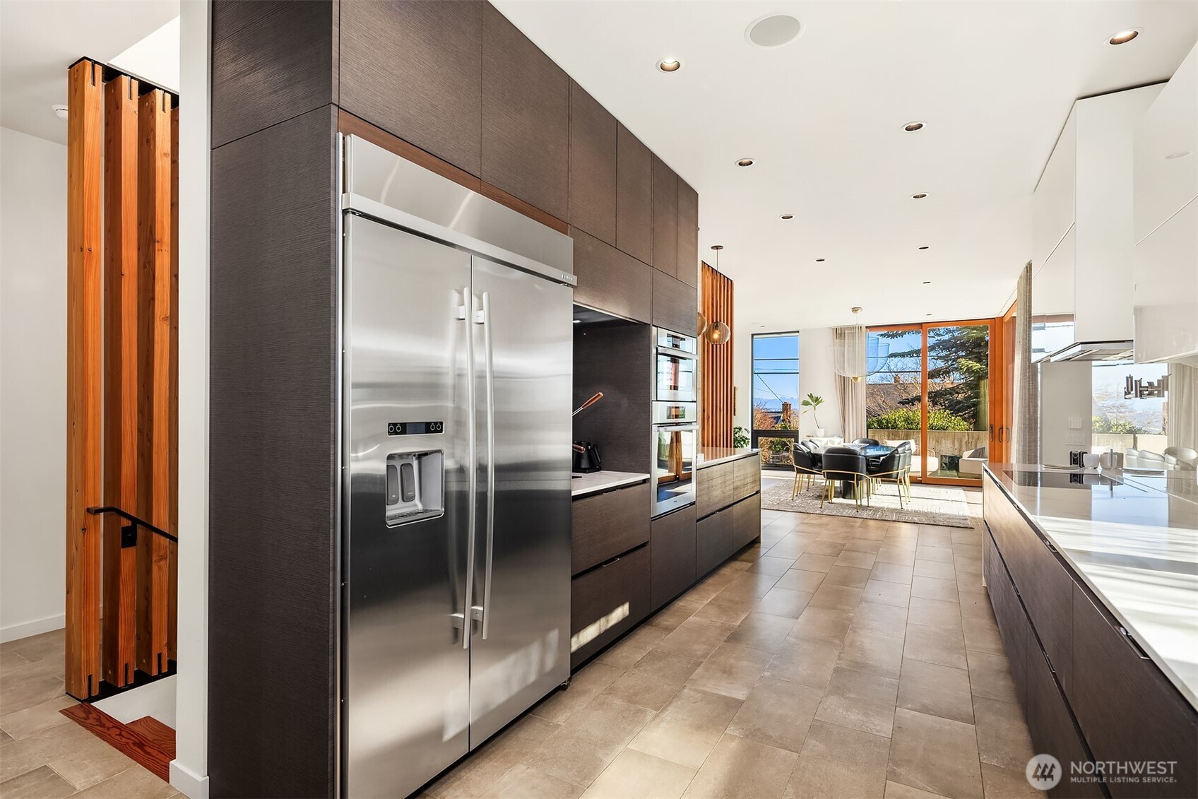 3057 36th Avenue Southwest Seattle, WA 98126 - Photo 15 of 40 a view of a living room and a kitchen