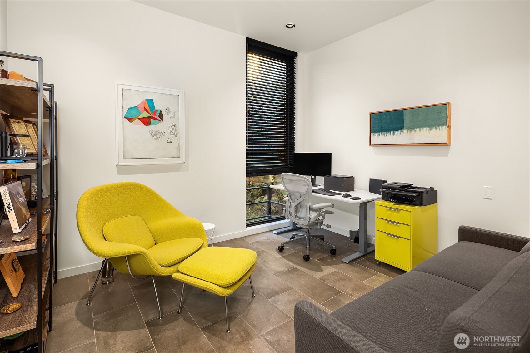 3057 36th Avenue Southwest Seattle, WA 98126 - Photo 16 of 40 a view of a workspace with furniture