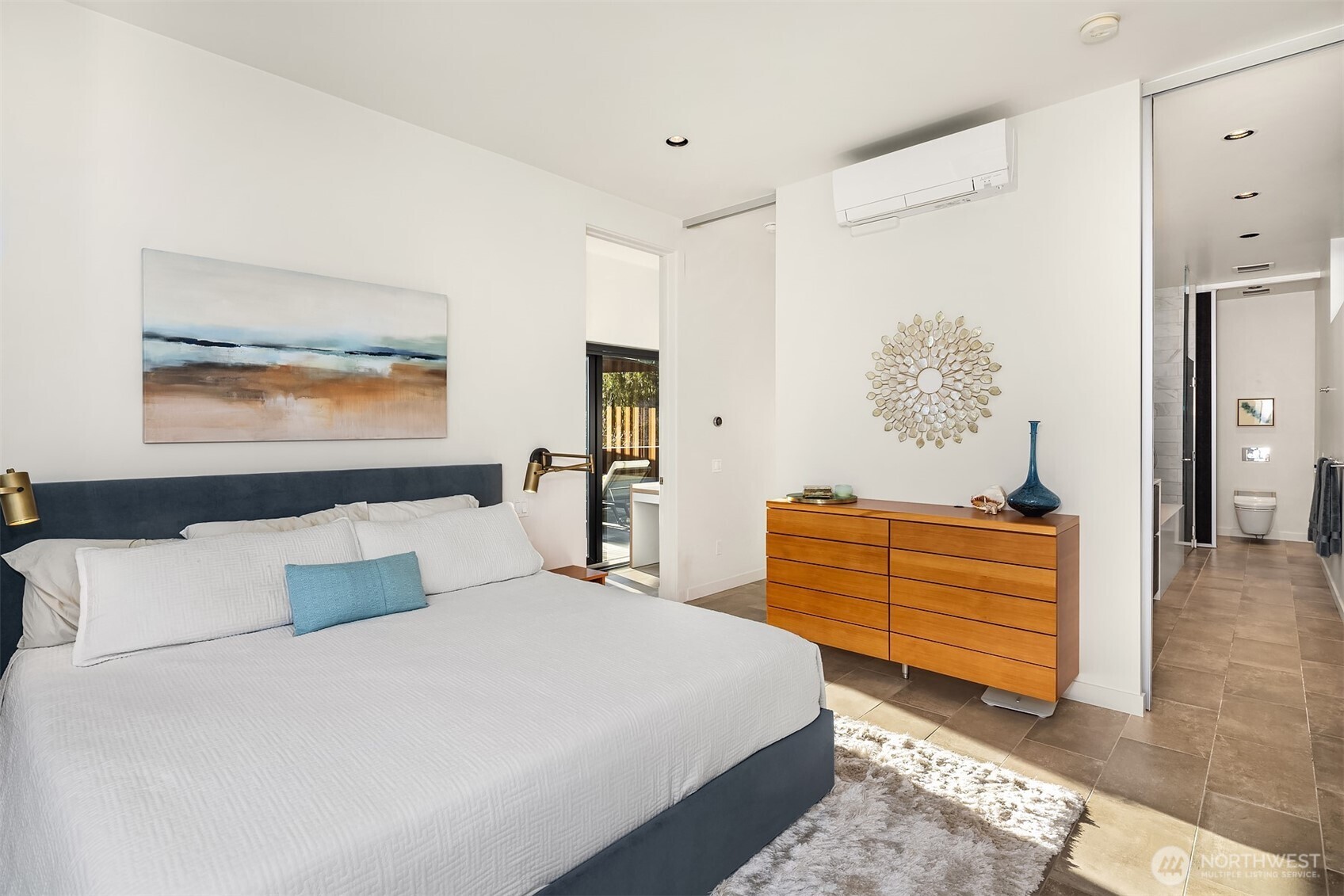 3057 36th Avenue Southwest Seattle, WA 98126 - Photo 26 of 40 a bedroom with a bed and a dresser