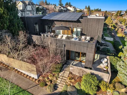 a view of a city with lawn chairs