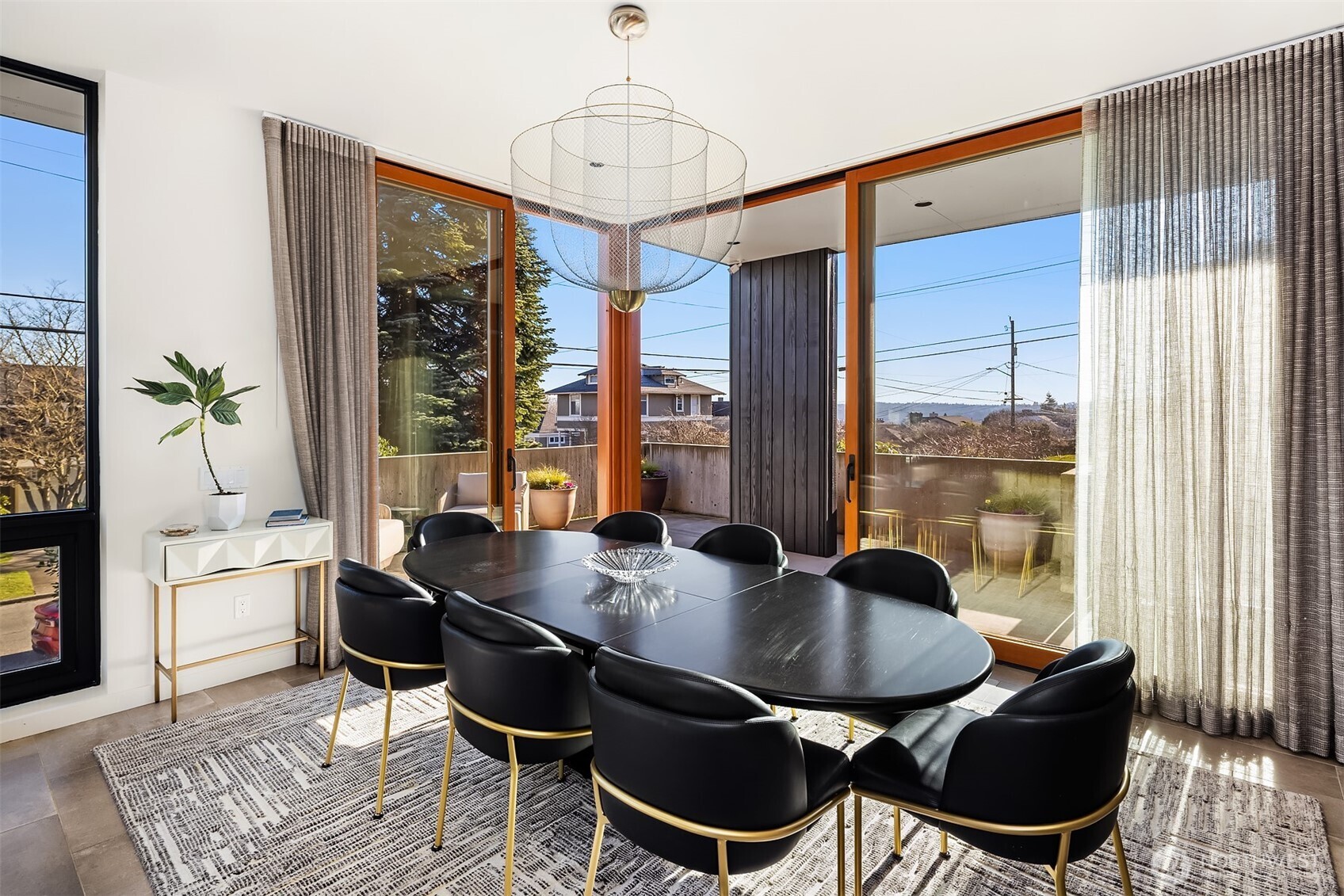 3057 36th Avenue Southwest Seattle, WA 98126 - Photo 6 of 40 a dining room with furniture a chandelier and wooden floor
