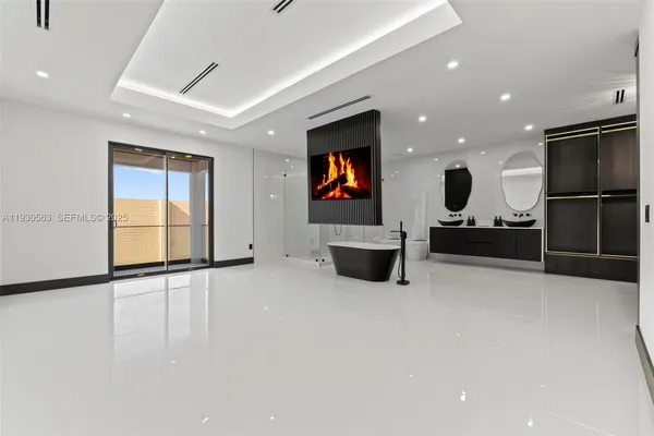 a bathroom with a double vanity sink and a mirror