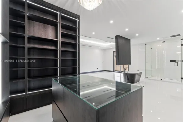 a room with gym equipment and a large window