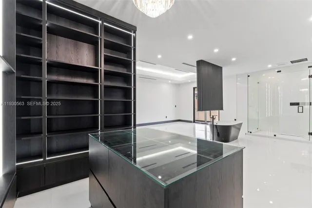 a room with gym equipment and a large window