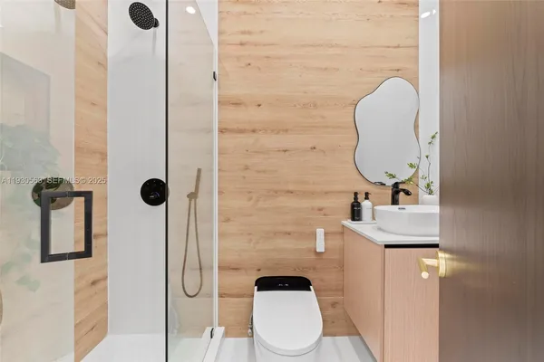 a view of an empty room with a fireplace