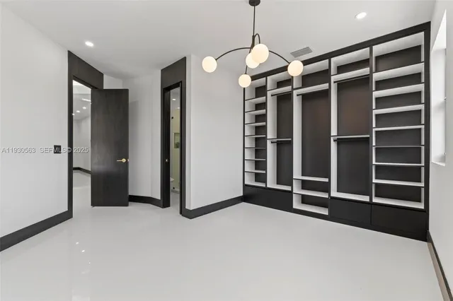 a bathroom with a toilet sink and shower