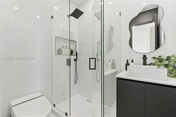 a view of an empty room with a window