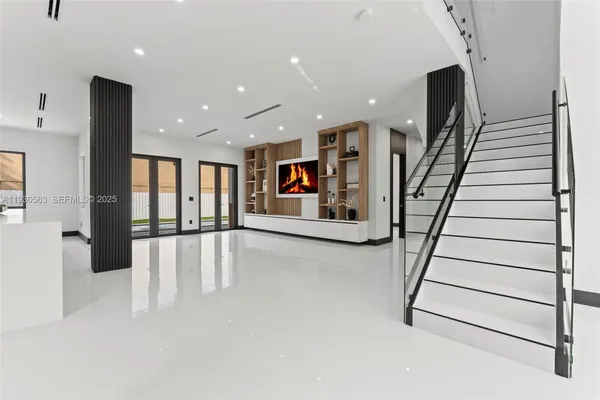 a view of an entryway with stairs