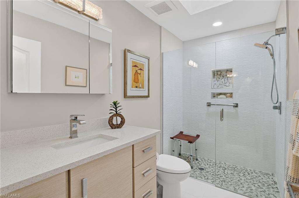 2248 Prince Lane Naples, FL 34112 - Photo 30 of 47 a view of bathroom with a sink toilet and shower