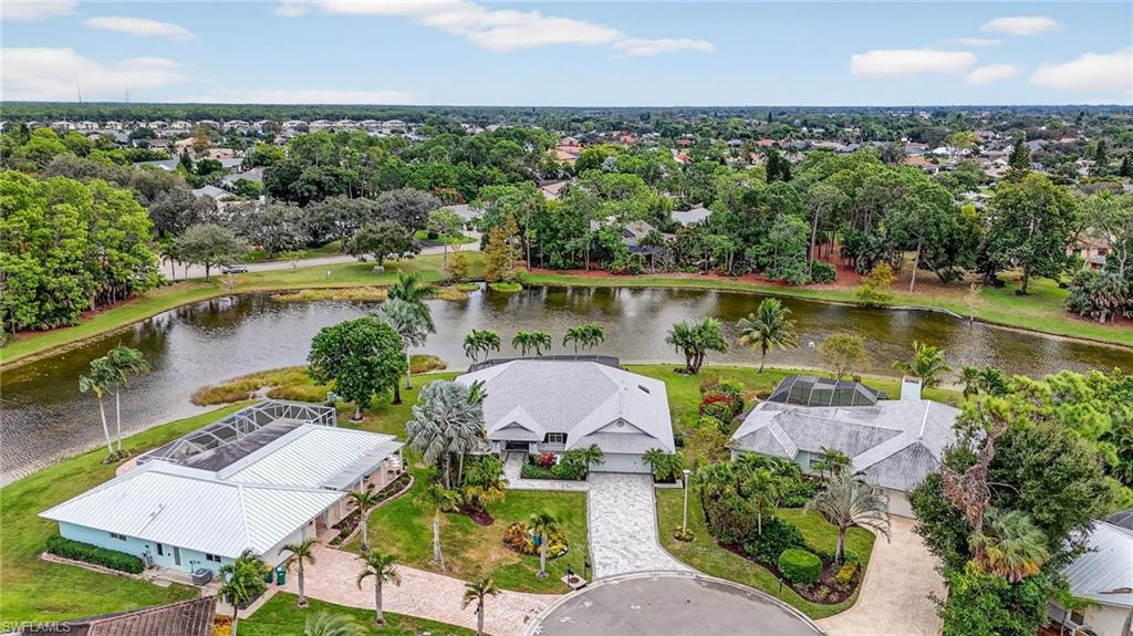 2248 Prince Lane Naples, FL 34112 - Photo 4 of 47 an aerial view of a house with outdoor space and lake view