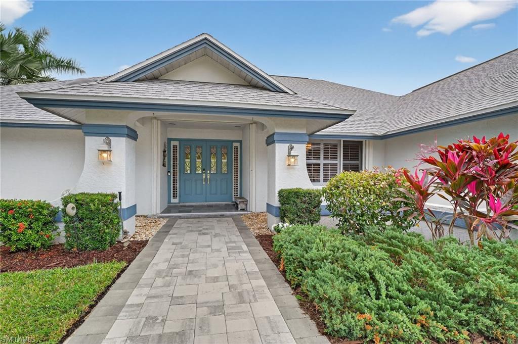 2248 Prince Lane Naples, FL 34112 - Photo 6 of 47 a view of a house with potted plants