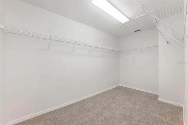 a view of a room with racks on the wall