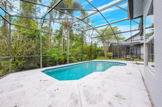 a swimming pool with a yard