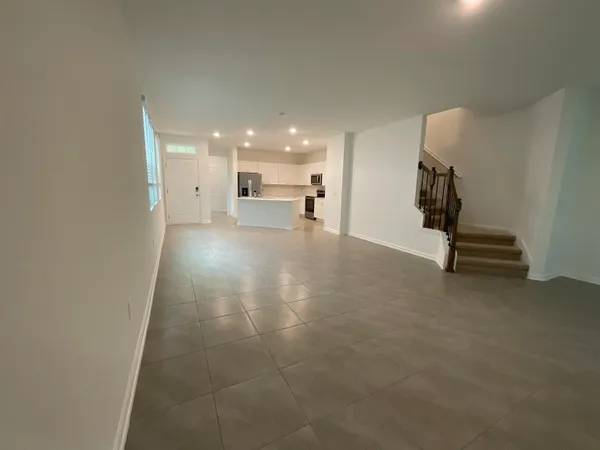 a view of a livingroom with a staircase