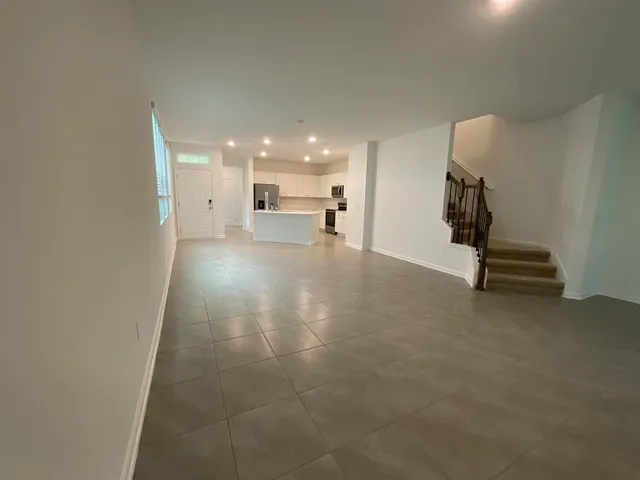 a view of a livingroom with a staircase