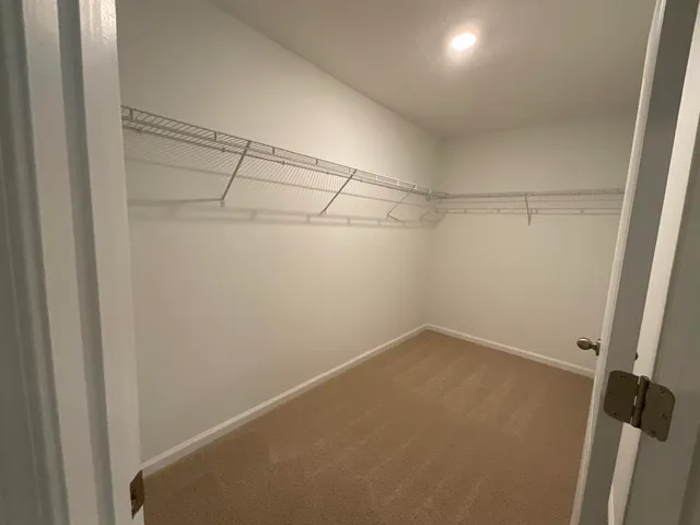 a view of a room with racks on the wall