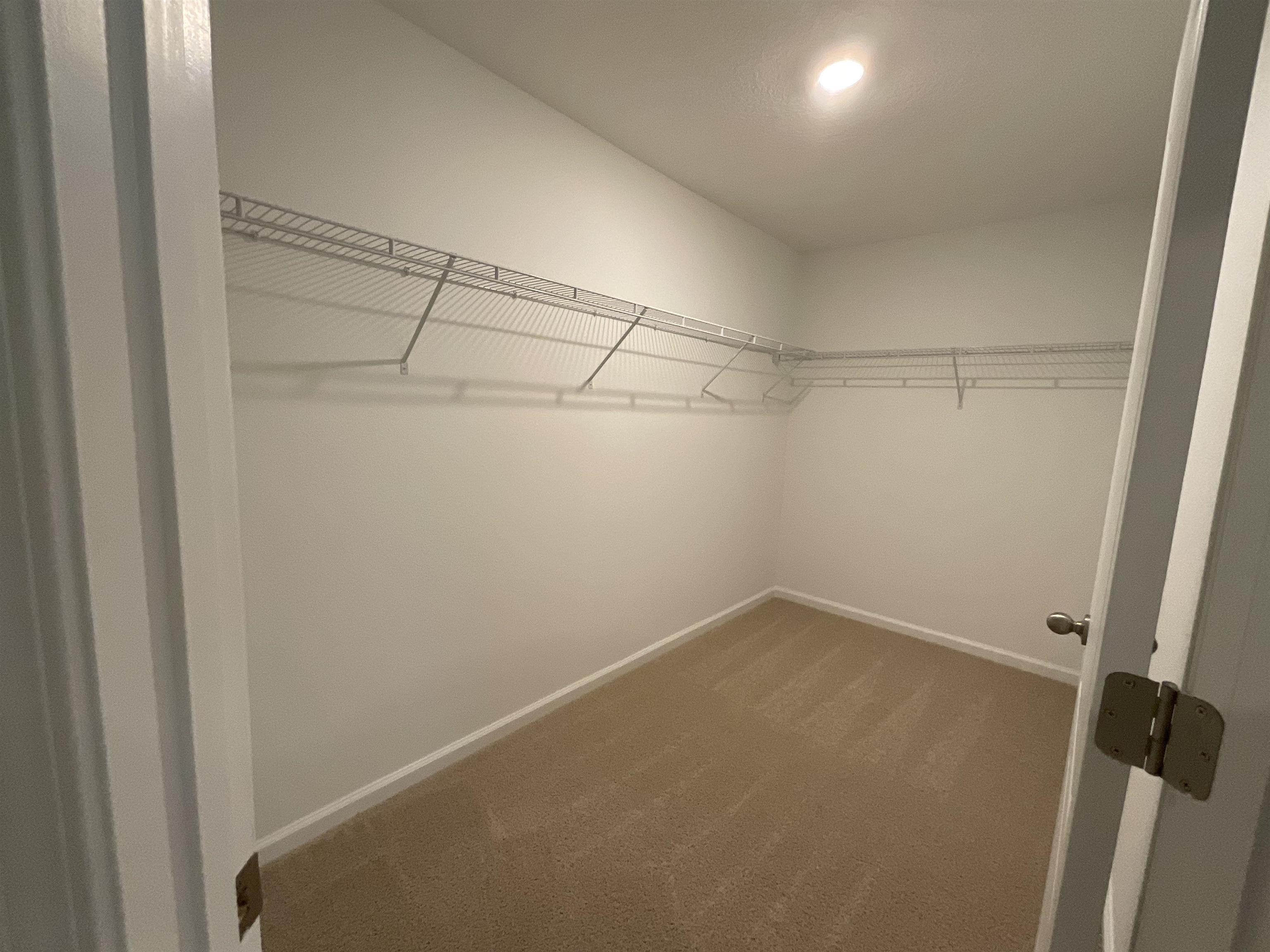 245 Seaport Breeze Road St. Augustine, FL 32095 - Photo 14 of 23 a view of a room with racks on the wall