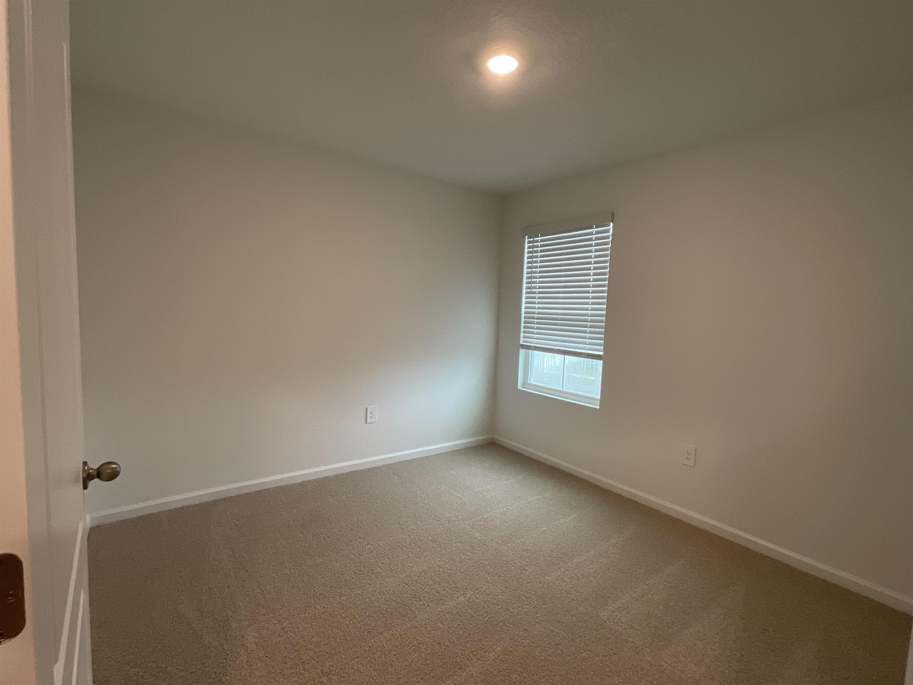 245 Seaport Breeze Road St. Augustine, FL 32095 - Photo 20 of 23 an empty room with a window