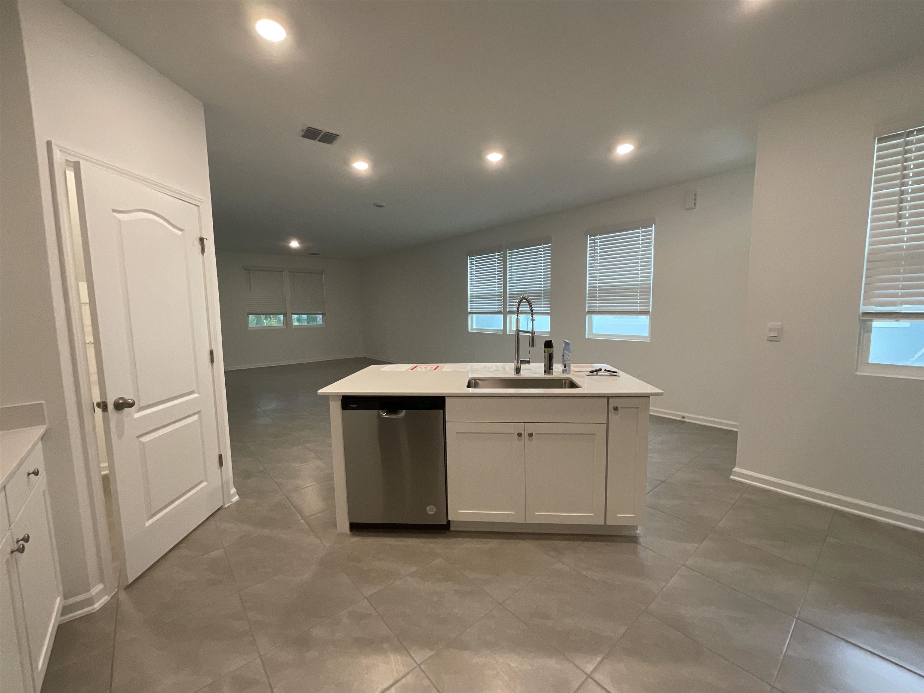 245 Seaport Breeze Road St. Augustine, FL 32095 - Photo 7 of 23 a bathroom with a sink and a mirror