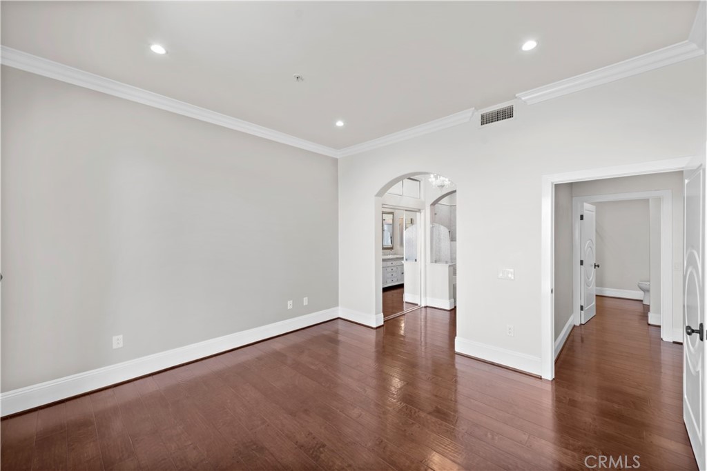 25 Splendore Drive Newport Coast, CA 92657 - Photo 7 of 16 wooden floor in an empty room with a window