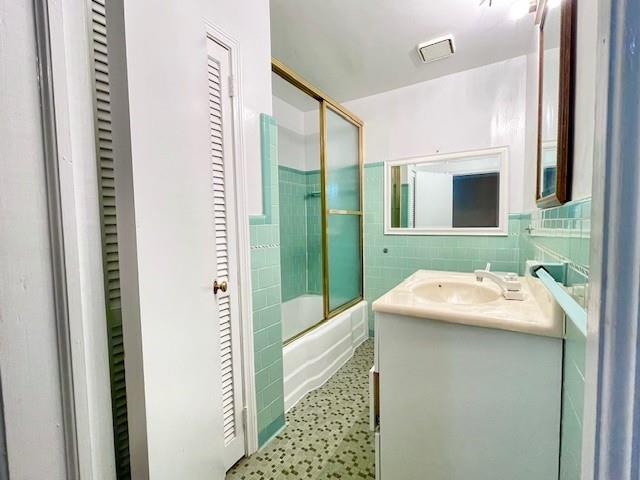 2396 Lavista Road Northeast Atlanta, GA 30329 - Photo 15 of 28 a bathroom with a sink and a mirror