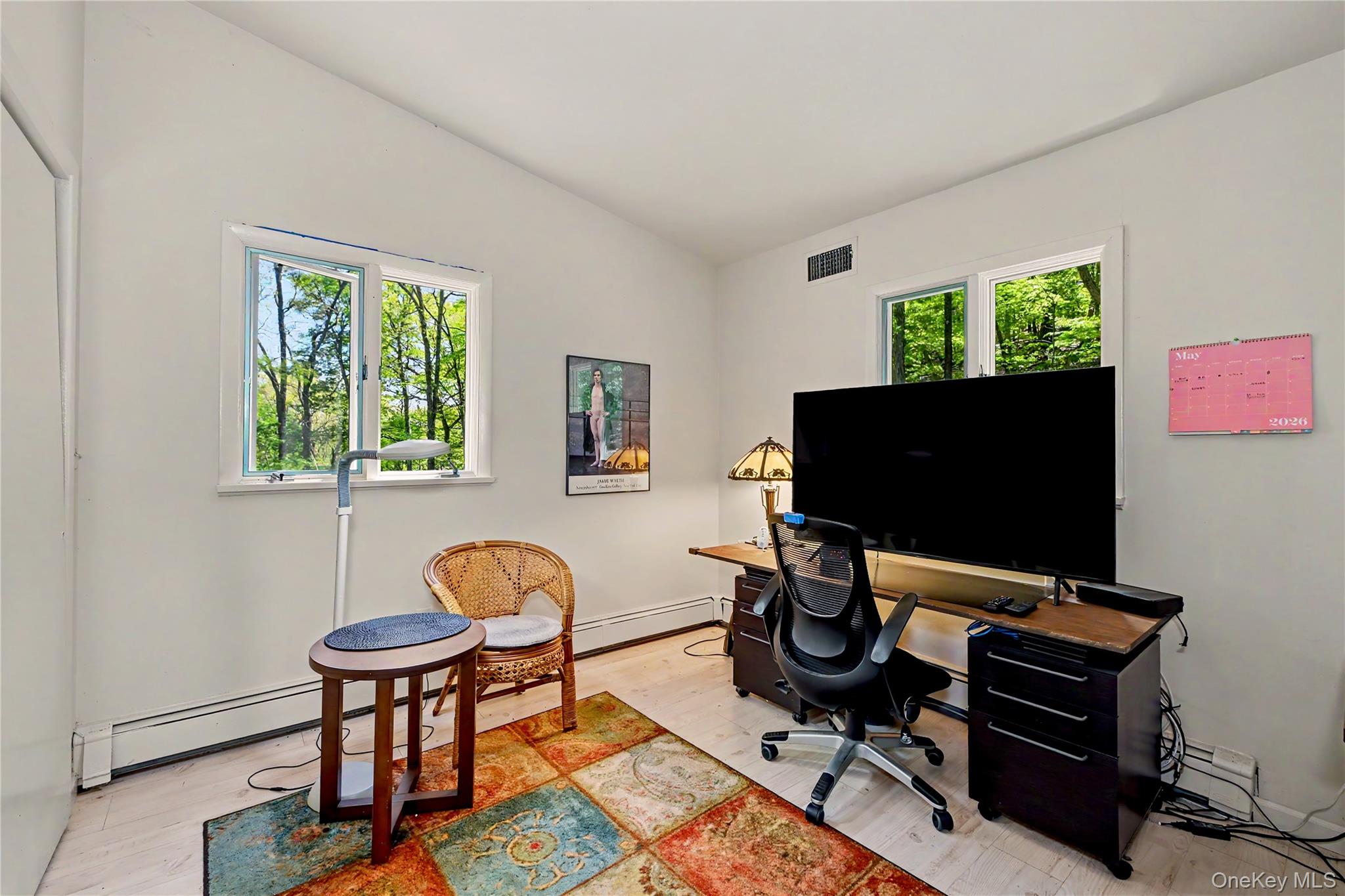 631 Croton Falls Road Carmel, NY 10512 - Photo 26 of 43 a living room with furniture and a flat screen tv