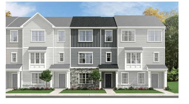 a view of a building next to a yard