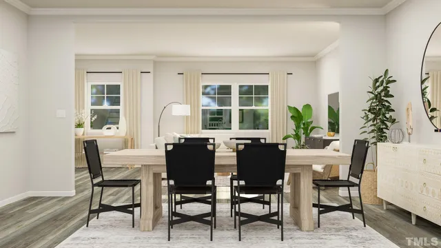 a view of a dining room with furniture and a mirror