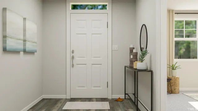 a view of a kitchen from the hallway