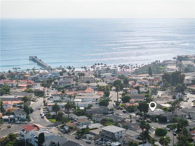 an aerial view of a city with lots of residential buildings