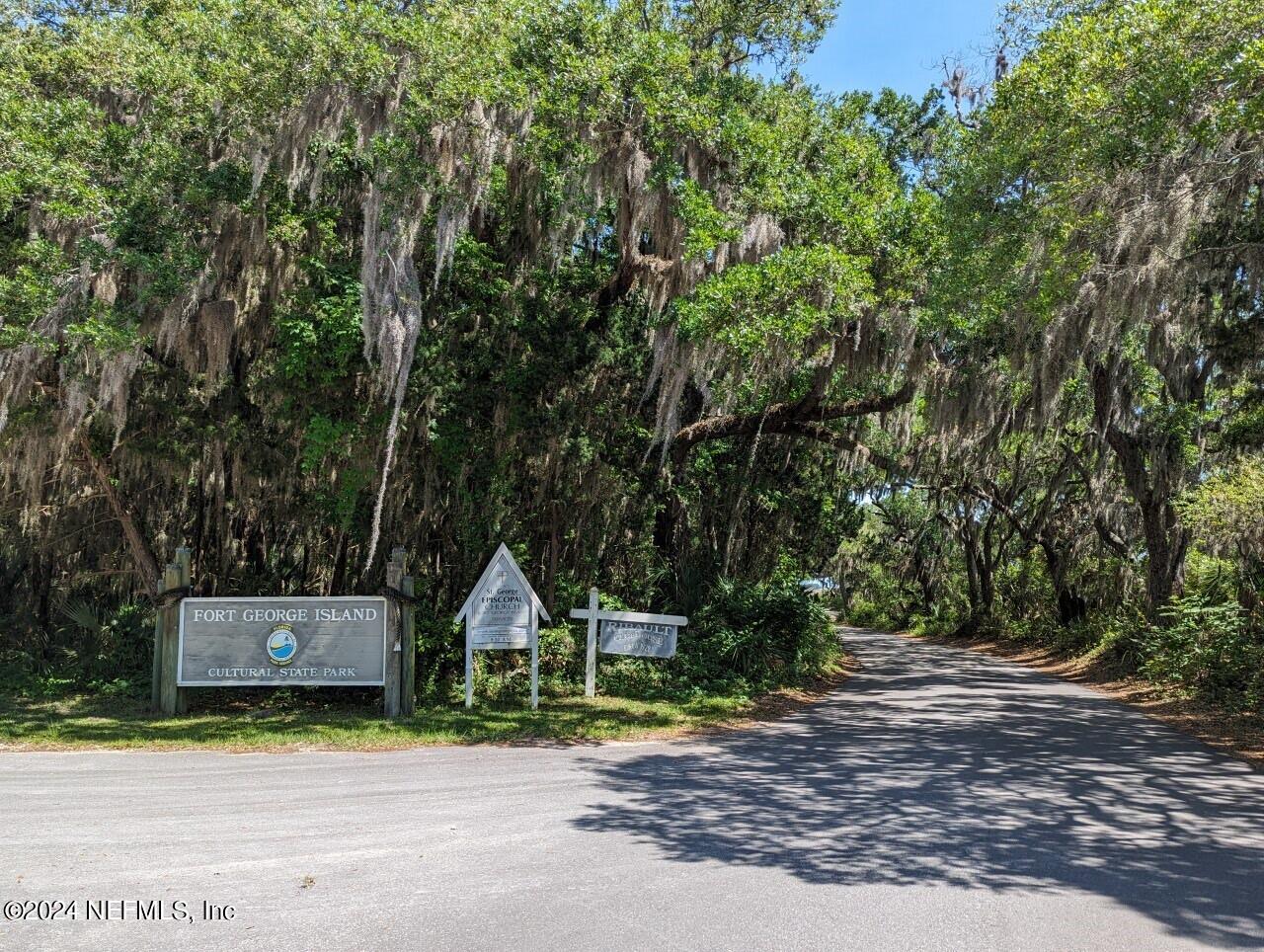 0 Salt Marsh Trail Jacksonville, FL 32226 - Photo 32 of 37 a front view of a house with a yard and garage