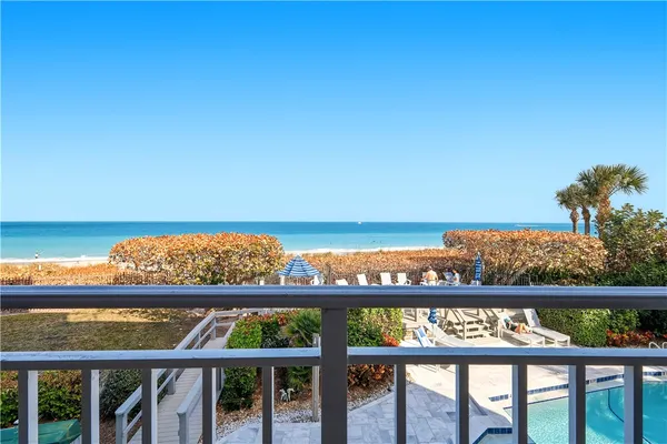 a view of city with ocean