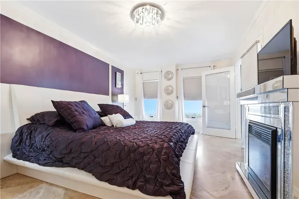 a living room with furniture a dining table and kitchen view