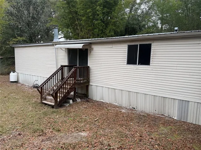 a view of a house with a outdoor space