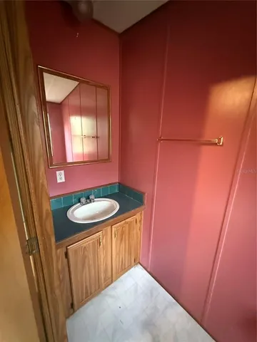 a view of empty room with windows