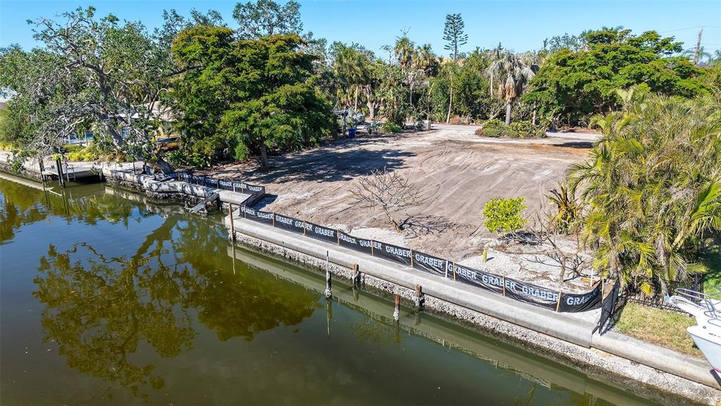 660 Longview Drive Longboat Key, FL 34228 - Photo 32 of 35 a view of swimming pool with a yard