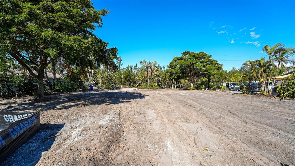 660 Longview Drive Longboat Key, FL 34228 - Photo 9 of 35 a view of road and with trees