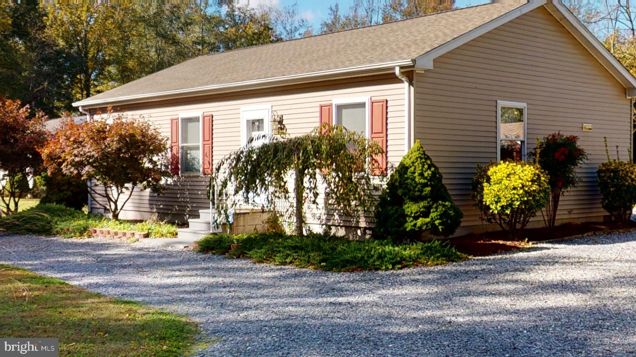 20865 Hummingbird Road Ellendale, DE 19941 - Photo 1 of 17 Front of the home