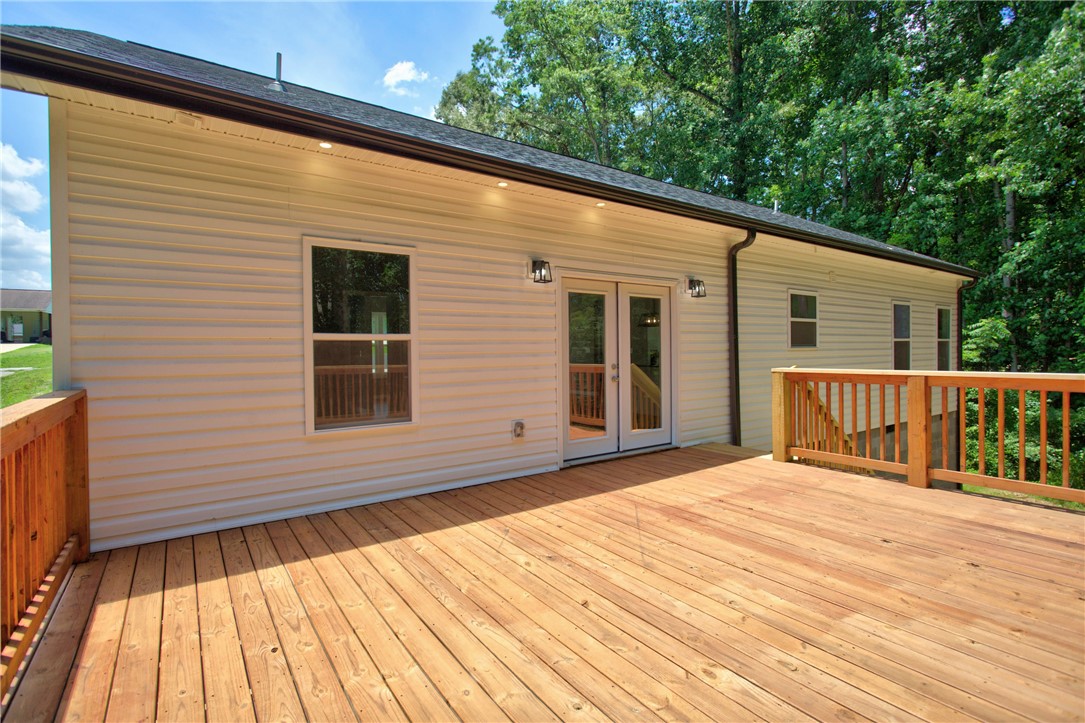 223 Maple Drive Anderson, SC 29621 - Photo 32 of 45 A spacious outdoor deck provides ample room for leisure and entertaining.