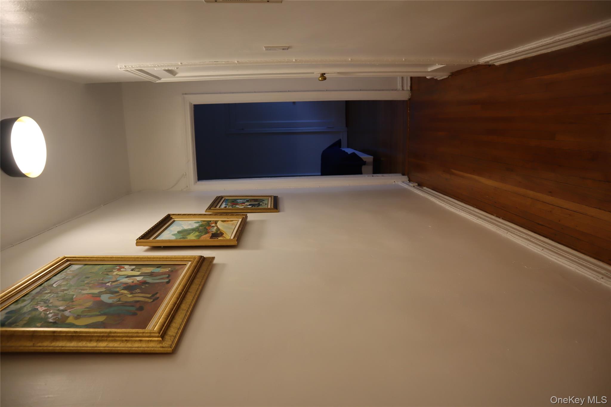 86-10 34th Avenue, Unit 624 Queens, NY 11372 - Photo 9 of 20 Hall with dark wood finished floors and baseboards