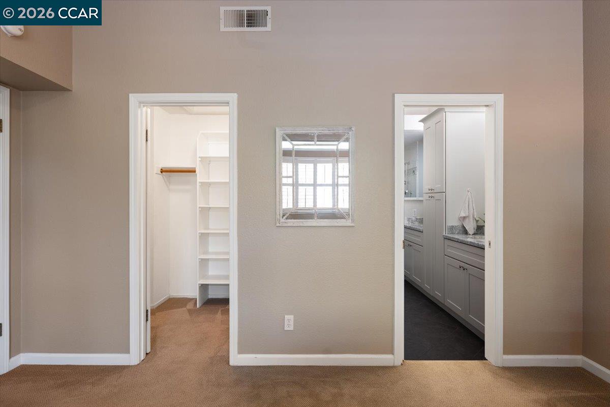 57 Karkin Place Clayton, CA 94517 - Photo 15 of 36 an empty room with windows and closet
