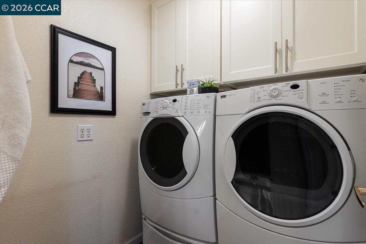 57 Karkin Place Clayton, CA 94517 - Photo 20 of 36 a utility room with dryer and washer