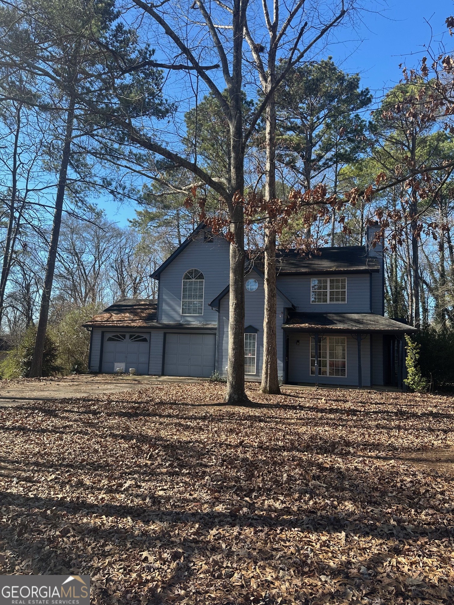 205 Fairview Point Ellenwood, GA 30294 - Photo 1 of 1 a house with trees in front of it