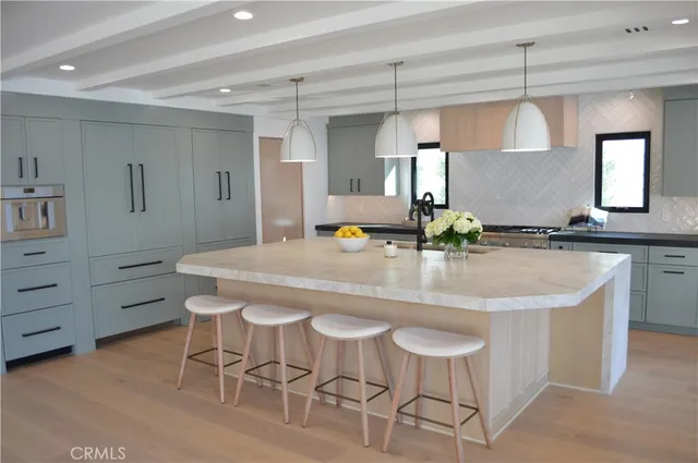 a view of a dining room with furniture and window