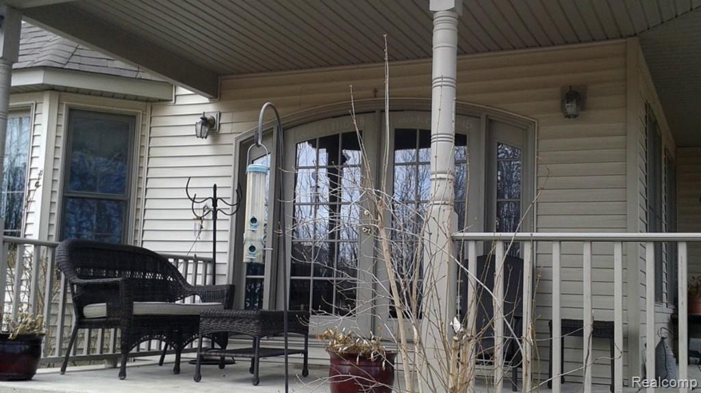 10390 Palmer Road Maybee, MI 48159 - Photo 15 of 39 back porch 2.jpg